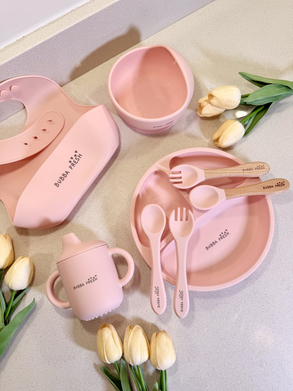 Bubba Fresh pink mealtime set on the kitchen counter